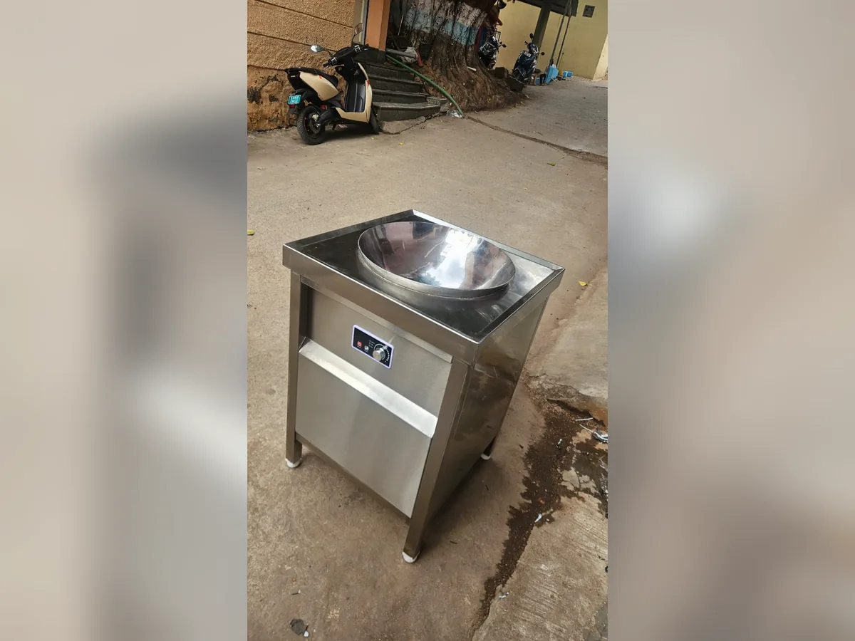 Rathin induction wok concave cooking unit